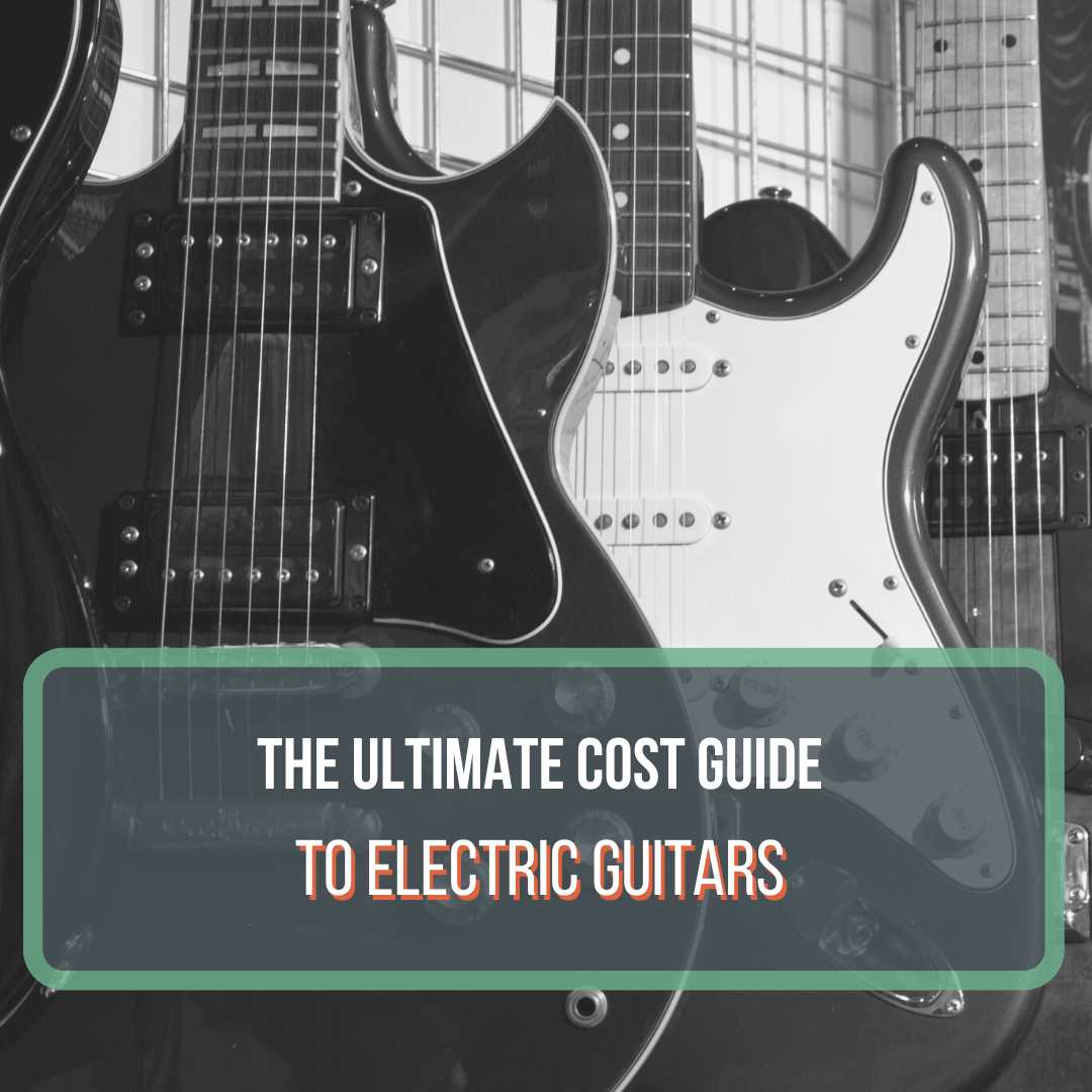 This is a black and white picture of electric guitars hanging on a wall in a guitar shop. There is a Gibson and a Fender that are in the shot. This is a featured image for the blog post "How much does an electric guitar cost."