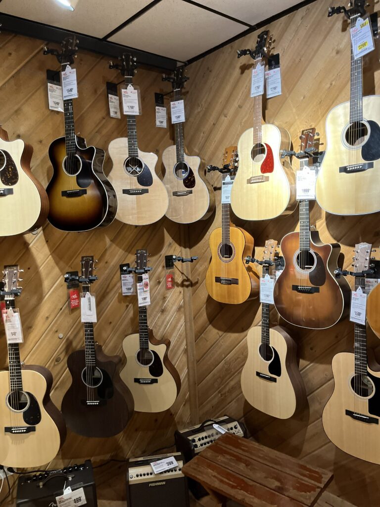 This is a picture of the high-end acoustic guitar room at Guitar Center in Fountain Valley, CA.